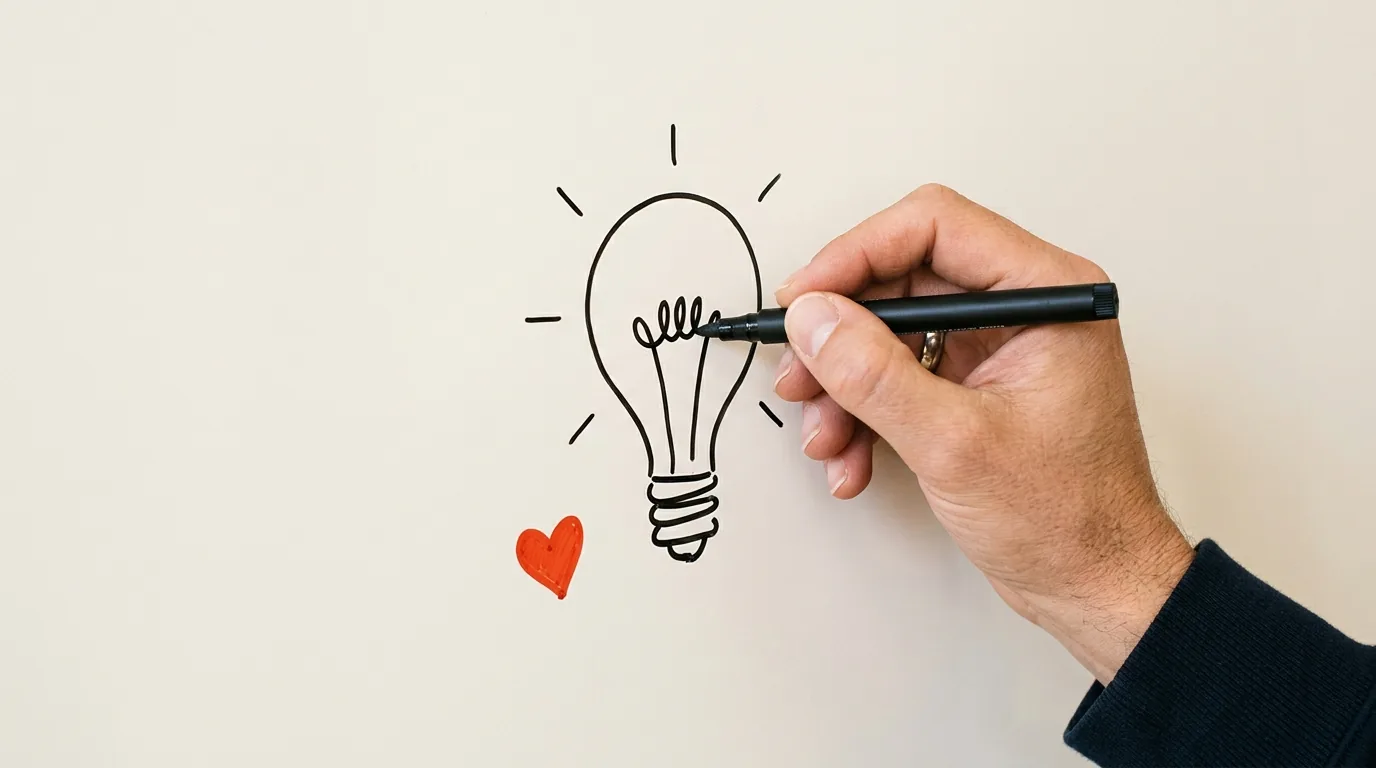 A hand drawing a lightbulb, the Wisko AI look